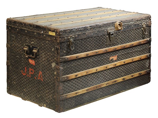 French E. Goyard steamer trunk: French E. Goyard steamer trunk, circa 1900, having a hinged top with signature chevron canvas and patinated lock, opening to an open interior with original E. Goyard label, Goyard label at one side, 2