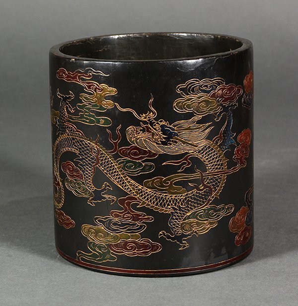 Chinese Lacquer Brush Pot, Dragons: Chinese polychrome lacquered brush pot, decorated with a red and a blue meandering dragon amid colored clouds, the base with an apocryphal Qianlong mark, 5.25"h