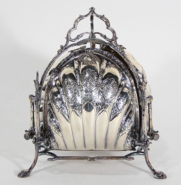 Victorian silver plate biscuit box, by george Travis&: Victorian silver plate biscuit box, by George Travis & Company, Sheffield, England, 1864-1908, the folding trefoil shell mounted with pierced grills, and raised on shaped supports, 10.5"h