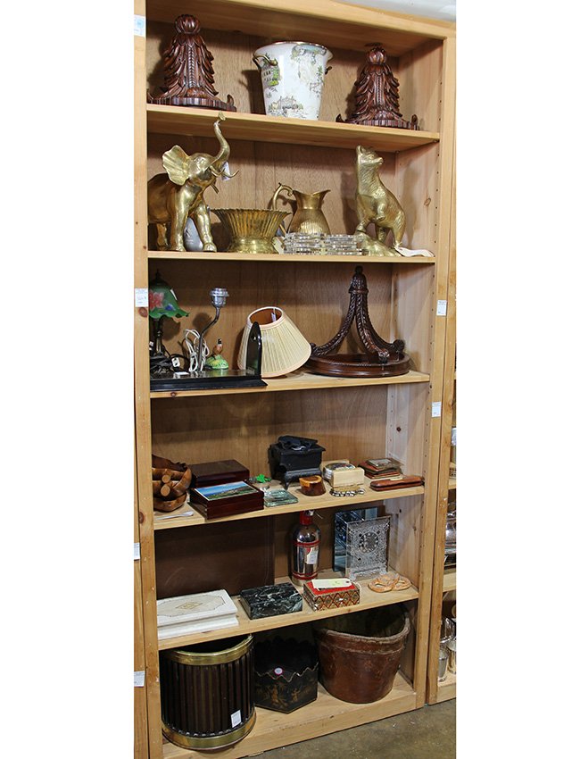 Six shelves of associated decorative accessories,: Six shelves of associated decorative accessories, including, (3) carved acanthus from wall brackets, a McKenzie Childs enameled metal ice bucket, an art glass boudoir lamp, a porcelain Limoges box mou