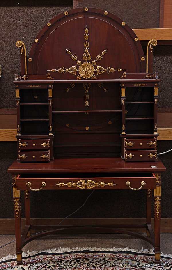 French Empire style secretary: French Empire style secretary, executed in mahogany, the superstructure having a dome crest with gilt rosette reserves flanking the central medallion having scroll work accents surmounting the open ga