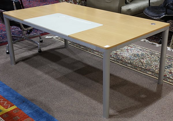 East End Desk by Piero Lissoni for Matteograssi: East End Desk by Piero Lissoni for Matteograssi, Bene Group, the beech top having a molded coach leather desk pad, and rising on a tubular anodized frame, 28.5"h x 71"w x 39"d