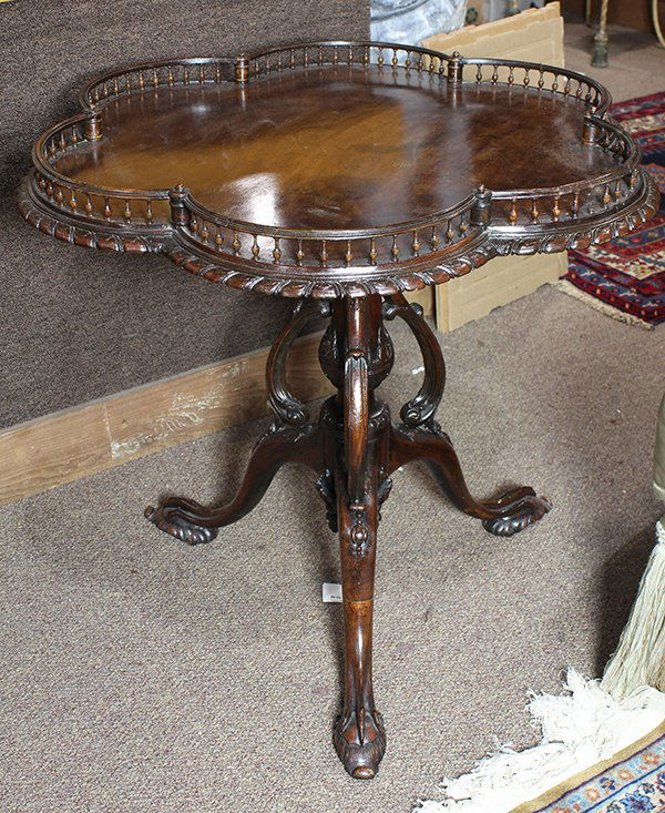 English mahogany tripod tea table, second half 19th: English mahogany tripod tea table, second half 19th century, the lobed pierced gallery top above a columnar standard with three bird form supports, and rising on a tripod base terminating on carved ta