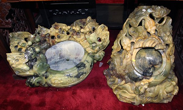 Two Chinese Alabaster Fountains: (lot of 2) Chinese alabaster fountains/fish bowls, the mottled green matrix each carved with gold fish in high relief, one with a compressed circular body carved 'jin yu man tang', 16"h × 30"w