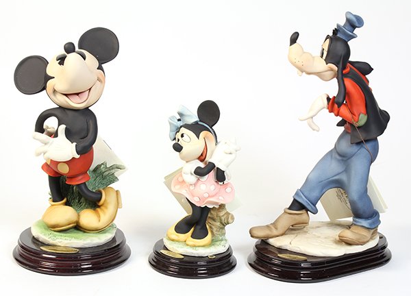 (lot of 3) Georgia Armani Disney figural groups: (lot of 3) Georgia Armani Disney figural groups, one depicting Mickey Mouse, another Minnie Mouse, and the third depicting Goofy, each bearing Florence sculture d'arte tag (each retaining original box