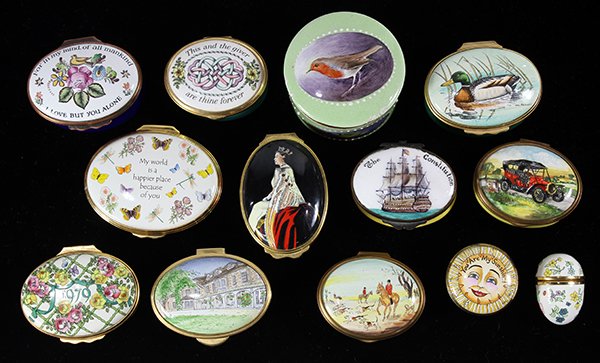 (lot of 13) Collection of Limoges and English: (lot of 13) Collection of Limoges and English polychrome painted pill boxes, some depicting scenic reserves, others depicting vintage autos, birds, etc., several examples by Halcyon Days enamels. Prov