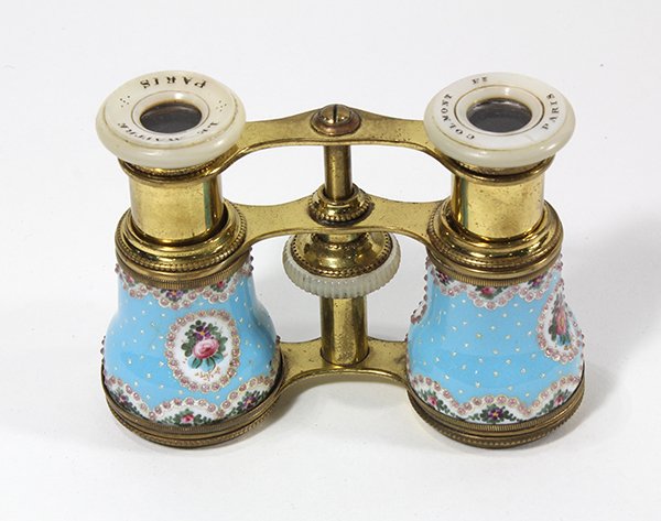 French enamel decorated opera glasses: French enamel decorated opera glasses, having a blue body centered with a floral reserve, 3"h