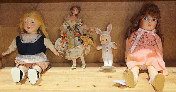 (lot of 4) Two Italian Lenci style dolls, each made: (lot of 4) Two Italian Lenci style dolls, each made differently of cloth with painted features; together a composition doll haivng a molded socket head and painted facial features; and a Kewpie Bunny