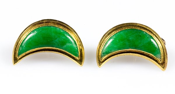 Pair of jadeite and yellow gold earrings: Pair of jadeite and yellow gold earrings featuring a pair of crescent moon jadeite cabochons measuring approximately 19 x 6.5 x 2.5 mm, bezel set in 24k yellow gold mountings with 10k yellow gold scre