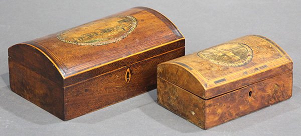 (lot of 2) Domed and marquetry decorated table boxes: (lot of 2) Domed and marquetry decorated table boxes, 19th century, of rectangular form, each centering a decoupaged scenic reserve and having an escutcheon, larger 3.5"h x 8.5"w x 5"d, smaller, 3"h x