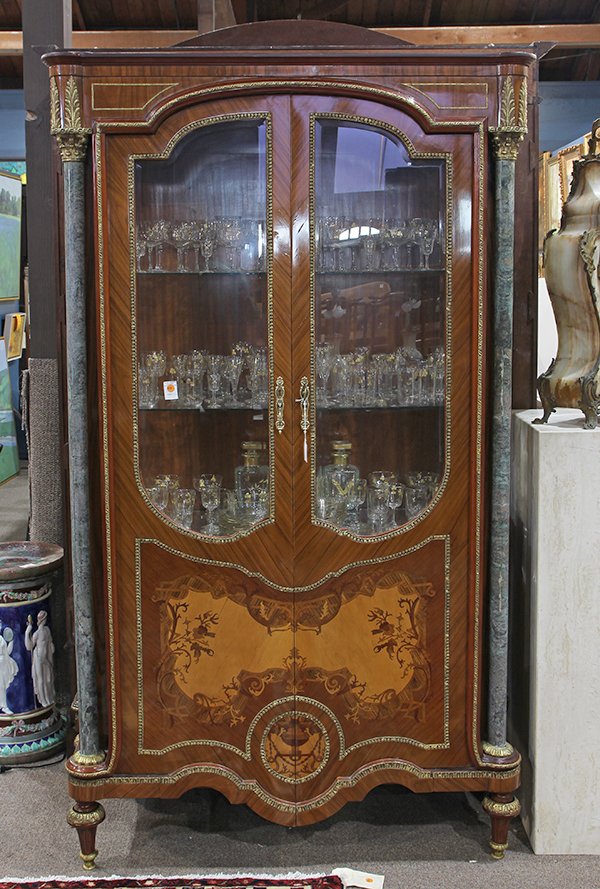 French Neoclassical style ormolu mounted vitrine: French Neoclassical style ormolu mounted vitrine, having green marble columnar pilasters with Corinthian capitals, flanking the inlaid case with two doors having beveled glass panels, opening to two f