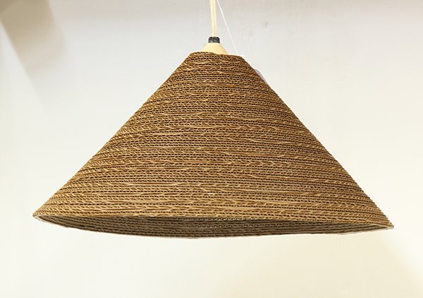 Frank Gehry (American: Frank Gehry (American, born Canada, 1929) hanging light fixture, having a cone form, executed in corrugated cardboard, unsigned, 11"h