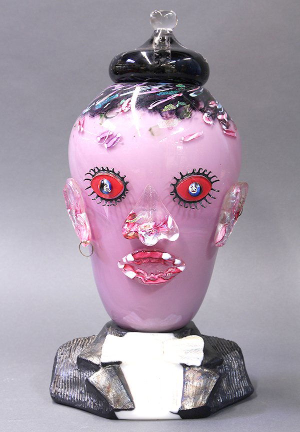 Signed and dated Murano style art glass figural covered: Signed and dated Murano style art glass figural covered potpouri jar, 1993, in the form of a bust of a man, executed in pink and black cased glass with iridescent inclusions, having applied metal eyel