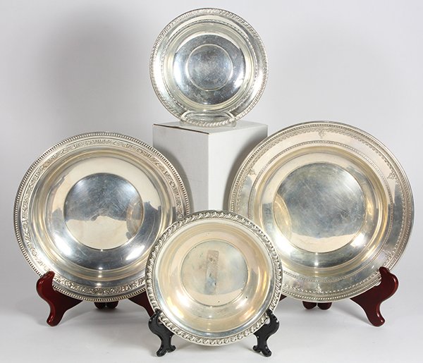 American sterling silver bowls 19.05 troy oz.: (lot of 4) American sterling silver bowls consisting of two gadrooned border bowls, one by Hunt Silver; and two fruit bowls by Dominick & Haff and Watson Company, each executed in the Neo-Classical ma