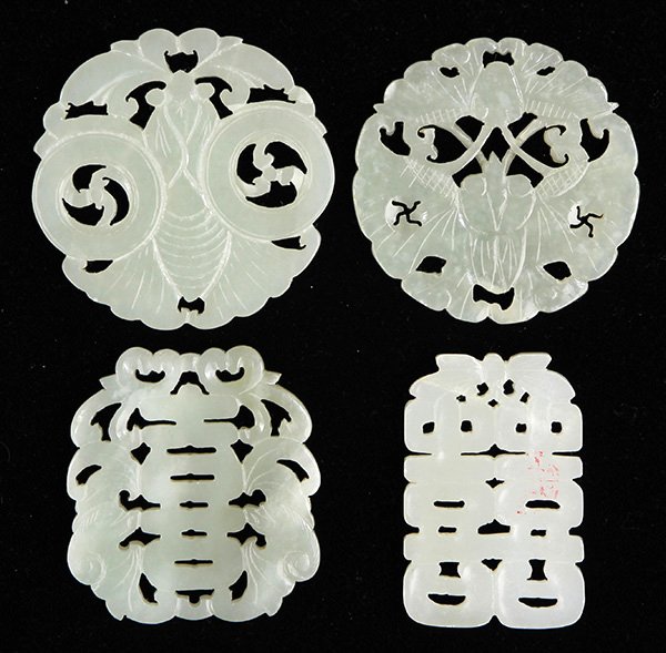 Chinese Jade/Serpentine Plaques: (lot of 4) Chinese jade plaques; consisting of two butterfly roundels, one of a shou character flanked by bats; together with a serpentine plaque with a butterfly above shuangxi emblem, largest: 2.125