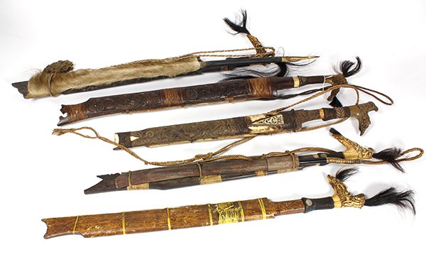 (lot of 5) Dayak swords with scabbards, having carved: (lot of 5) Dayak swords with scabbards, having carved horn handles, four with black hair plumes, three grips are bound with woven rattan thread, two are bound in cotton thread, the blades have a chise