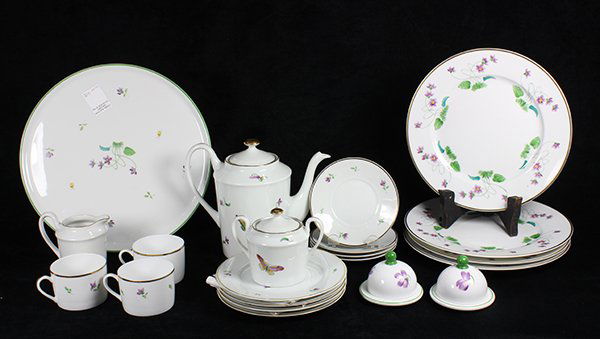 Bernardaud Limoges partial table service, each having a: Bernardaud Limoges partial table service, each having a gilt rim, centering violet decoration, consisting of (4) dinner plates, 10.5"dia.; (3) tea cups and (4) saucers; (4) dessert plates; a cream and