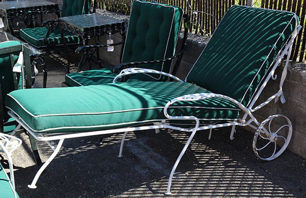 Contmeporary white painted garden glass top table and: (lot of 3) Contemporary white painted garden glass top table and two chaise lounges, largest: 28"h x 60"w x 34.5"d. Provenance: From the Ligonier, PA estate of Richard Mellon Scaife