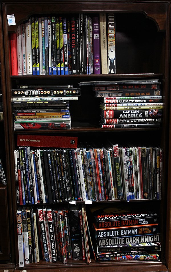 Marvel and DC Comics: (lot of approx. 130) Marvel and DC Comics mostly hardcover graphic novels including Captain America Omnibus; DC Comics Who's Who; Superman Cover to Cover; Batman Cover To Cover; Superman-Batman Public