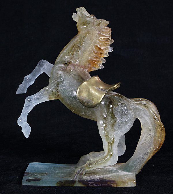 Daum, France, pate de verre figure: Daum, France, pate de verre figure depicting a rearing stallion, having a gilt saddle and rising on a rectangular base, signed "Daum, France, 1999", with original box, 9.5"h