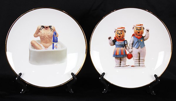 Jeff Koons Banality Series Plates: (lot of 2) Jeff Koons (American, b. 1955), "Woman in Tub," and "Winter Bears," 2013, each from the Banality Series, screenprints on glazed porcelain plates with gold enamel trim, each from an edition