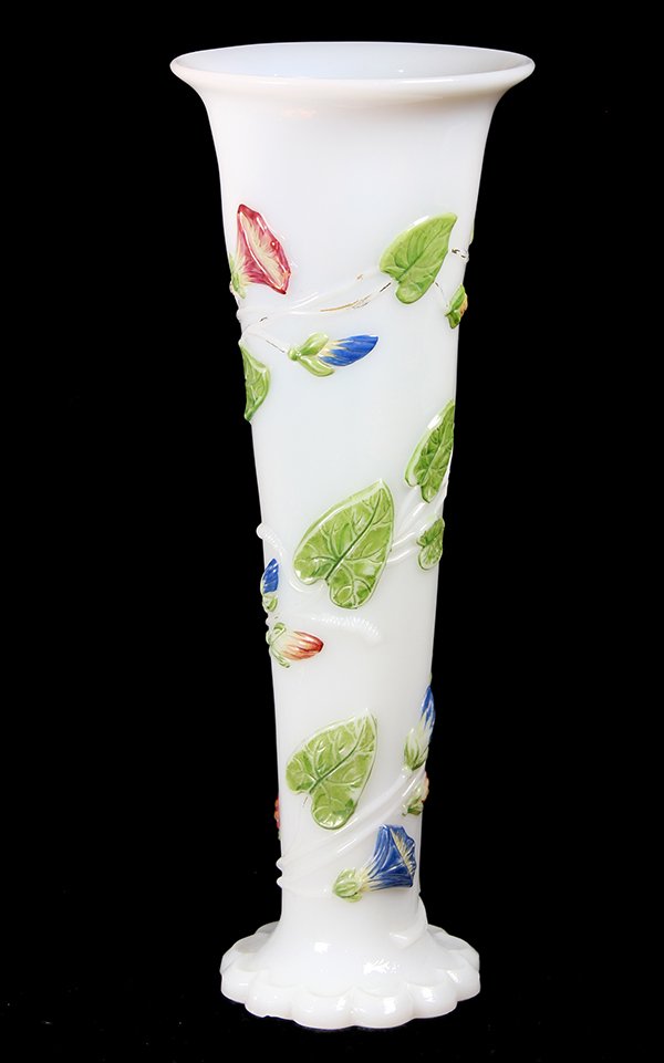 French Victorian opaline glass vase attributed to: French Victorian opaline glass vase attributed to Baccarat, the tapered body accented with applied floral and vine sprays continuing to the circular base, 14"h. Provenance: Property from the collecti