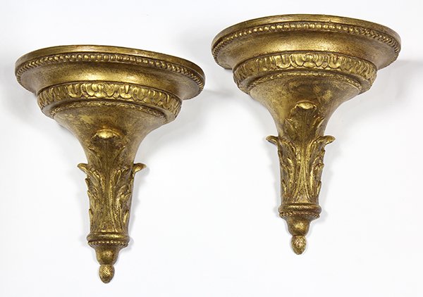 Pair of Neoclassical gilt wall brackets: Pair of Neoclassical gilt wall brackets, of demilune form accented with an acanthus reserve, 12"h x 10"w Provenance: From the Ligonier, PA estate of Richard Mellon Scaife