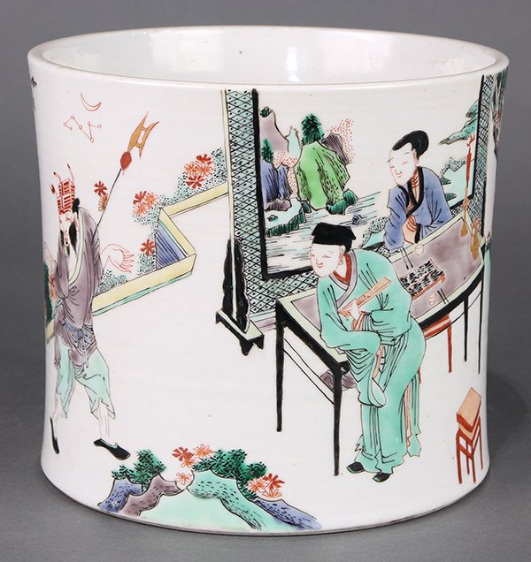 Chinese Famille Verte Brush Pot: Chinese famille verte porcelain brush pot, depicting a scholar and beauty in front of a single panel screen in a garden, watching a performance, the base with an apocryphal 'Shendetang zhi' mark, 7.12
