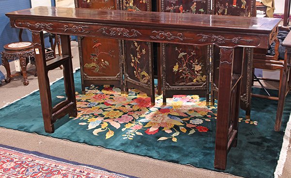 Chinese Altar Table, Fruits: Chinese hardwood altar table, with a single floating top panel, above the apron carved with grapes and peaches in relief, raised on straight supports, 41"h × 83"w × 17"d