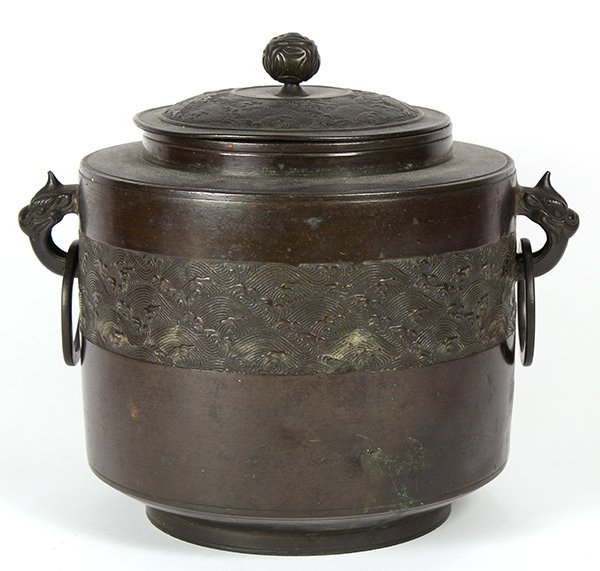Japanese Bronze Chagama Tea Kettle, Meiji: Japanese bronze chagama tea kettle, Meiji period, lid and middle of the body with wave motifs, zoomorphic handle with ring on either side, (dent) 10"h x 8.5"dia