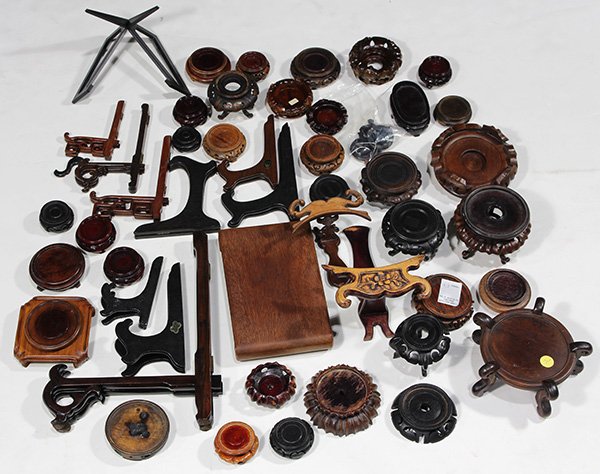 Box of Wood Stands: (lot of approximately 45) One box of Asian stands, of various types and sizes, largest: 13"h. Provenance: Estate of Dr. Graeme Hanson, San Francisco, CA
