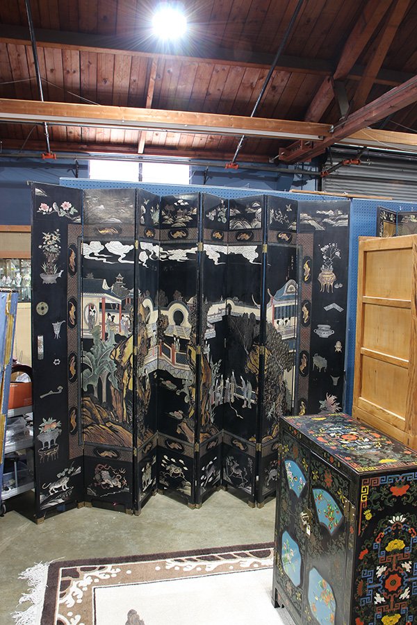 Chinese Coromandel Large Eight Panel Screen: Chinese Coromandel eight panel screen, black lacquered ground with beauties on a garden terrace. The large panels, flanked by scholars' items and with beasts on the lower reserves, reversed with crane