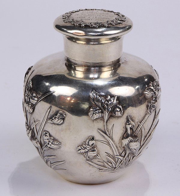 Chinese Export silver tea caddy by Luen Wo, Shanghai,: Chinese Export silver tea caddy by Luen Wo, Shanghai, late 19th/early 20th century, the shiny ground featuring repousse flowering foliate, a songbird and an egret, the cover decorated with repousse ch