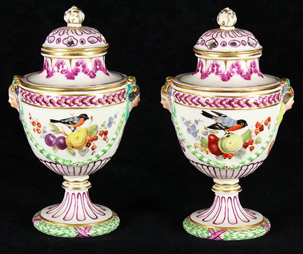 Frankenthal German porcelain potpourri urns: Frankenthal German porcelain potpourri urns, executed in the Neoclassical taste, having pierced lids with floral finials, mask handles and floral swags decorated with hand painted birds and fruit, ris