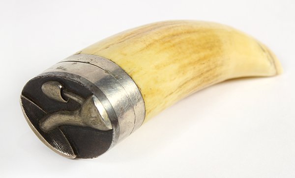 Victorian claw form snuff box: Victorian claw form snuff box, the carved and polished horn vessel mounted with a silver plate cap having bas relief mushrooms, 3.75"h x 1.5"w