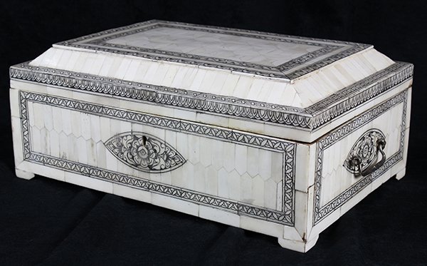 Indian bone veneered vanity box, possibly 19th century,: Indian bone veneered vanity box, possibly 19th century, in the style of an 18th century casket, the exterior covered in bone tiles having floral engraving and gadrooning with ink accents, the interior