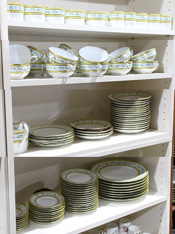 Limoges A. Raynaud & Co. porcelain table service: (lot of 87) Limoges A. Raynaud & Co.porcelain floral decorated partial table service consisting of twenty consomme bowls and saucers, fifteen bread plates and cups, eight dinner plates, nine cup and d