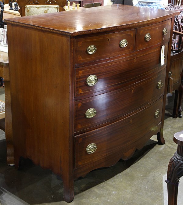 American Federal inlaid chest, early 19th century,: American Federal inlaid chest, early 19th century, having a rectangular top, above the five drawer case with inlaid banding, having a shaped apron and rising on outswept feet, 40"h x 43"w x 23"d. Prov
