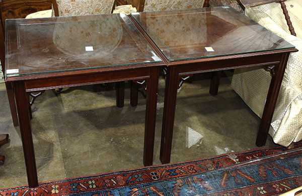 Chinese style side tables, each having a glass top, and: Chinese style side tables, each having a glass top, and rising on square legs, 24"h x 26"dia. Provenance: Property from the Carnelian Room (San Francisco, California)