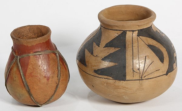 (lot of 2) Decorative vase group a Native American: (lot of 2) Decorative vase group a Native American Casas Grandes pottery jar with black geometric decoration, 4.5"h; and a Mexican pottery jarlet with leather strapping, 3."h