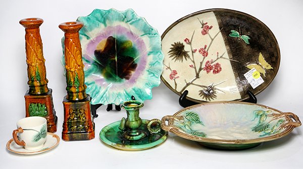 (lot of 8) Majolica table accessories, 19th century,: (lot of 8) Majolica table accessories, 19th century, including a Wedgwood Aesthetic Movement platter, 12"h x 9"w; a pair of Rococo style candle holders with mottled brown ground, 10"h, a bread tray wi