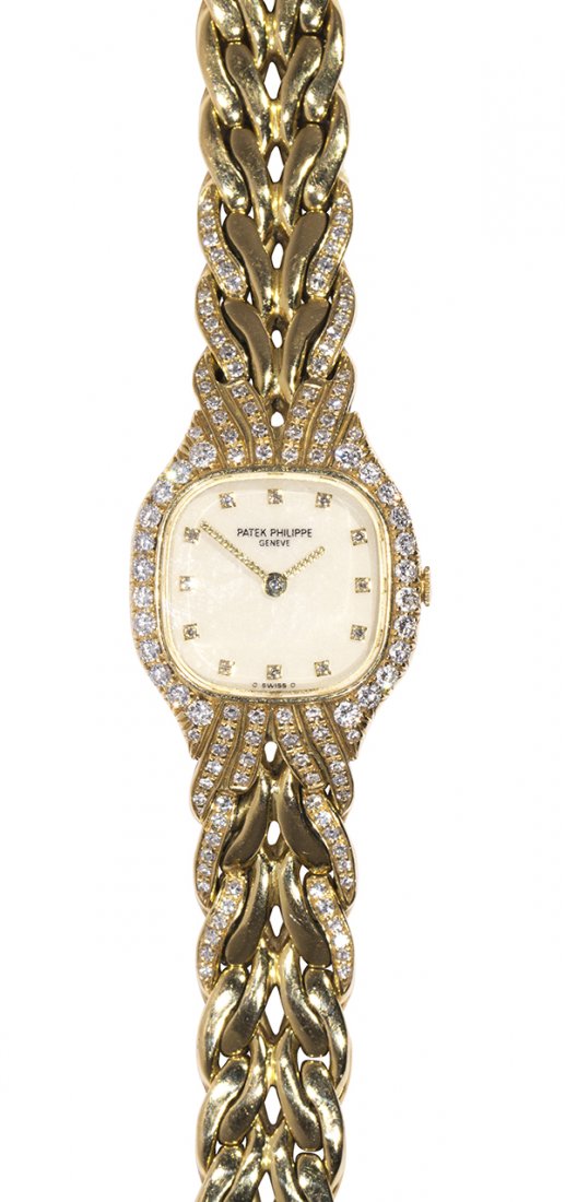 Lady's Patek Philippe La Flamme diamond and 18k yellow (1 of 6)