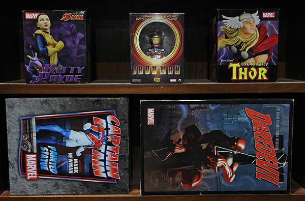 (lot of 5) Two shelves of Marvel comics statues (1 of 1)