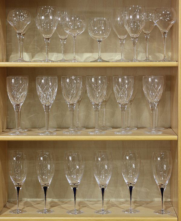 (lot of approximately 28) Crystal stemware by: (lot of approximately 28) Crystal stemware by Waterford, Orrefors, and Mikasa, consisting of John Rocha at Waterford water goblets; Orrefors champagne glasses with a cased cobalt stem; and Mikasa red