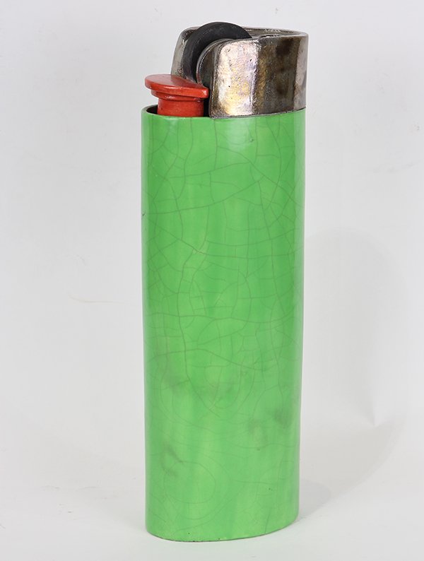 Sculpture by Karen Shapiro: Karen Shapiro (American, b. 1947), Giant Lighter, ceramic sculpture, stamped "K" on bottom, overall: 15"h x 5.25"w x 3.25"d.