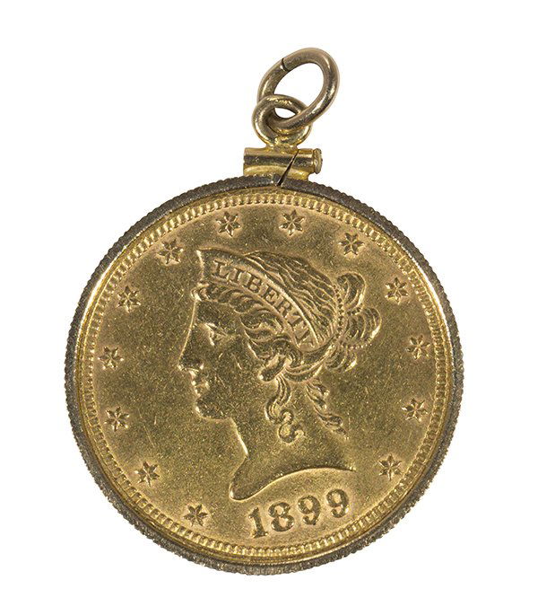 Gold coin and 14k yellow gold pendant: Gold coin and 14k yellow gold pendant featuring one United States Liberty ten dollar gold coin, dated 1899, set in a 14k yellow gold bezel mounting, weighs 18.9 grams