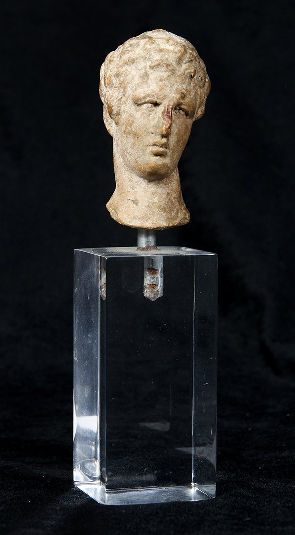 Roman style statuary fragment of a head (1 of 2)
