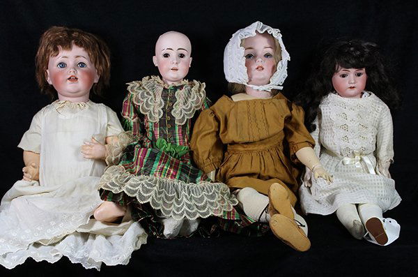 German antique J.D. Kestner bisque head dolls: (lot of 4) German antique bisque head dolls consisting of a J.D. Kestner 257 socket head doll having hand-painted and natural facial features, blue sleep eyes, and an open mouth with two upper teeth a
