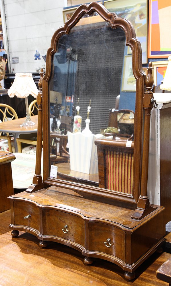 Queen Anne style walnut shaving mirror: Queen Anne style walnut shaving mirror, having a shaped looking glass surmounting the three door marquetry decorated case, and rising on spherical feet, 33"h x 21"w x 9"d Provenance: From the Ligonier