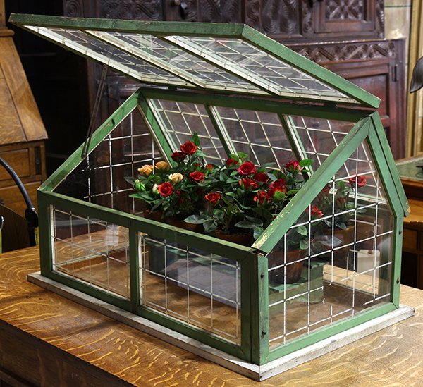 Victorian style polcyhrome painted terrarium: Victorian style polcyhrome painted terrarium, having a hinged top, above a pentagonal frame, 15"h x 25.5"w